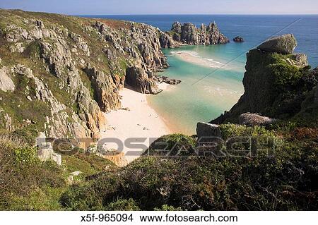 Treen Beach with Logans Rock in the distance Cornwall View Large Photo Image Picture - Treen Beach with Logans Rock in the distance Cornwall. Fotosearch