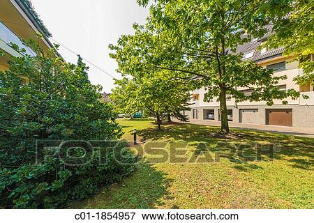 Trees between condominium buildings Strasbourg Alsace France View Large Photo Image Stock Photo - Trees between condominium buildings Strasbourg Alsace France. Fotosearch
