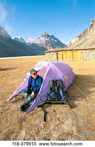 Trekker outside tent. Lhonak (4785mts). Kangchenjunga. Base camp. East Nepal View Large Photo Image Stock Image - Trekker outside tent. Lhonak (4785mts). Kangchenjunga. Base camp. East Nepal. Fotosearch