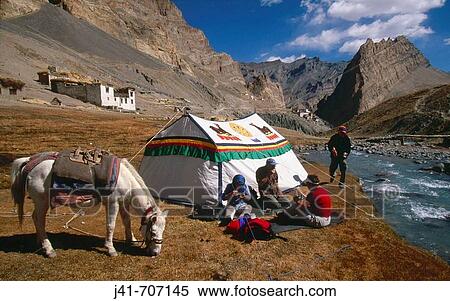 Trekkers camp with Tibetan tent above Photoskar village, Ladakh View Large Photo Image Stock Photography - Trekkers camp with Tibetan tent above Photoskar village, Ladakh. Fotosearch