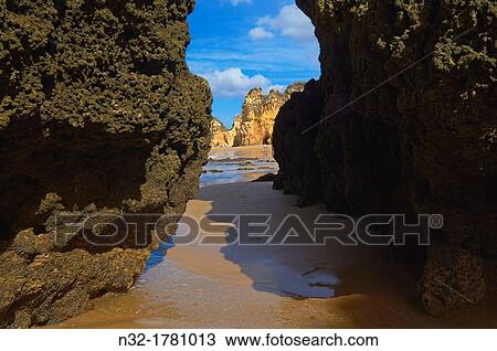 Tres Irmaos beach, Portimao, Alvor, Praia dos Tres Irmaos, Algarve, Portugal, Europe. View Large Photo Image Stock Image - Tres Irmaos beach, Portimao, Alvor, Praia dos Tres Irmaos, Algarve, Portugal, Europe.. Fotosearch