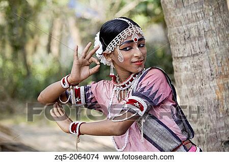 Tribal girl performing classical dance in gurukul. View Large Photo Image Picture - Tribal girl performing classical dance in gurukul.. Fotosearch