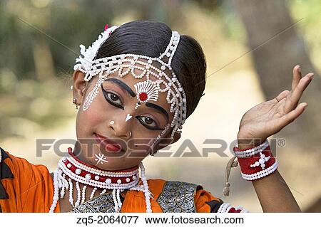 Stock Photo - Tribal girl performing classical dance in gurukul.. Fotosearch
