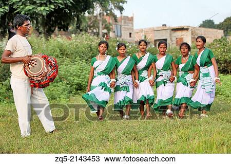 Tribal girls performing a typical tribal dance in traditional outfits. Oraon tribe. Hurhuru area of District Hazaribaug, Jharkhand, India. View Large Photo Image Stock Image - Tribal girls performing a typical tribal dance in traditional outfits. Oraon tribe. Hurhuru area of District Hazaribaug, Jharkhand, India.. Fotosearch