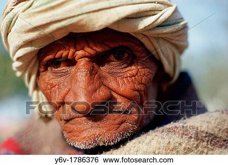 Tribal man. Rajasthan, India. He belongs to the Bhil tribe. View Large Photo Image Stock Photograph - Tribal man. Rajasthan, India. He belongs to the Bhil tribe.. Fotosearch