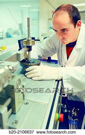 Stock Photo - Tribometer pin on disc. Laboratory surfaces. Tecnalia Research and Innovation. Donostia. San Sebastian. Gipuzkoa. Basque Country. Spain. Europe.. Fotosearch
