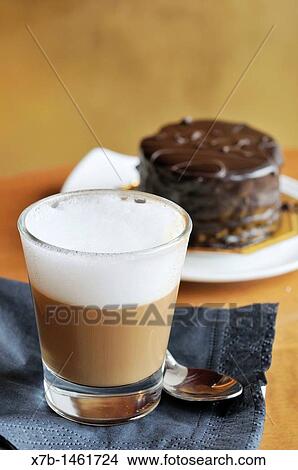 Trieste Italy Cappuccino in glass, locally known as a Capo? in b View Large Photo Image Picture - Trieste Italy Cappuccino in glass, locally known as a Capo? in b. Fotosearch