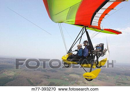 Stock Image - Trike flying, Ultralight airoplane. Sk? ne Sweden. Fotosearch