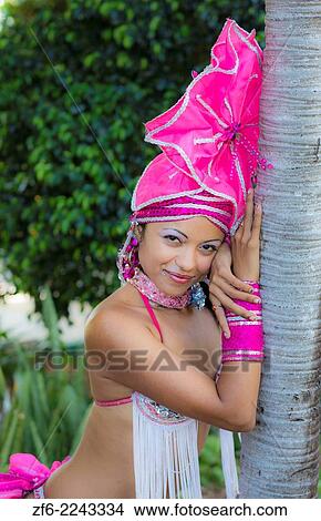 Trinidad Cuba beautiful dancer in costume portrait with headress and color from tourist show 12. View Large Photo Image Picture - Trinidad Cuba beautiful dancer in costume portrait with headress and color from tourist show 12.. Fotosearch