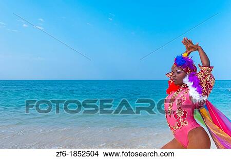 Trinidad Cuba dancer in costume on beautiful beach of ocean with sand View Large Photo Image Picture - Trinidad Cuba dancer in costume on beautiful beach of ocean with sand. Fotosearch