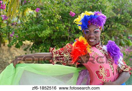 Trinidad Cuba dancer in costume with dance form and green background View Large Photo Image Stock Photograph - Trinidad Cuba dancer in costume with dance form and green background. Fotosearch