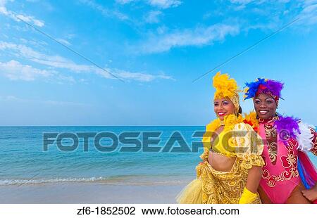 Trinidad Cuba dancers in costume on beautiful beach of ocean with sand View Large Photo Image Stock Image - Trinidad Cuba dancers in costume on beautiful beach of ocean with sand. Fotosearch