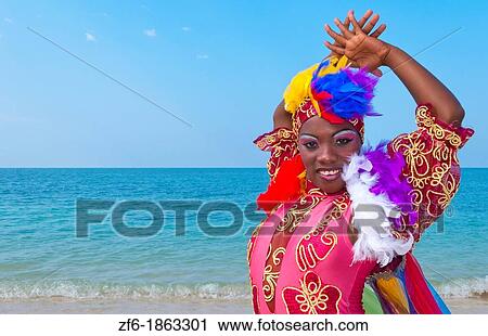 Trinidad Cuba dancers in costume on beautiful beach of ocean with blue water View Large Photo Image Stock Image - Trinidad Cuba dancers in costume on beautiful beach of ocean with blue water. Fotosearch