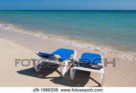 Trinidad Cuba ocean relax in chairs on beach with waves fopr Holidays in the Caribbean. View Large Photo Image Stock Photo - Trinidad Cuba ocean relax in chairs on beach with waves fopr Holidays in the Caribbean.. Fotosearch