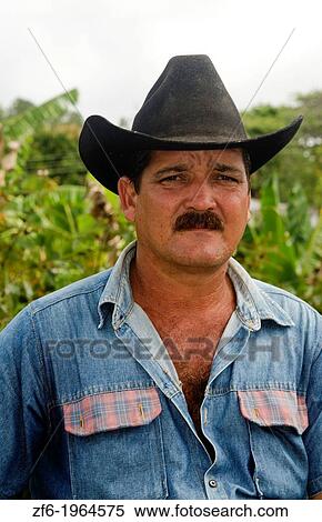 Trinidad Cuba real cowboy on horse riding on road portrait from ranch. View Large Photo Image Stock Photography - Trinidad Cuba real cowboy on horse riding on road portrait from ranch.. Fotosearch
