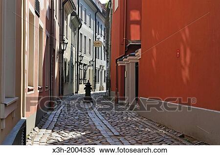 Stock Photography - Troksnu narrow street near the Parliament, Riga, Latvia, Baltic region, Northern Europe.. Fotosearch