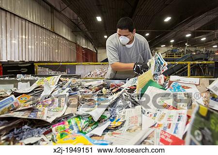 Troy, Michigan - Low-wage workers sort paper, glass, plastic, and metals for recycling at the Southeastern Oakland County Resource Recovery Authority. The materials are picked up in curbside recycling bins at homes in 12 suburban Detroit communities. View Large Photo Image Stock Image - Troy, Michigan - Low-wage workers sort paper, glass, plastic, and metals for recycling at the Southeastern Oakland County Resource Recovery Authority. The materials are picked up in curbside recycling bins at homes in 12 suburban Detroit communities.. Fotosearch