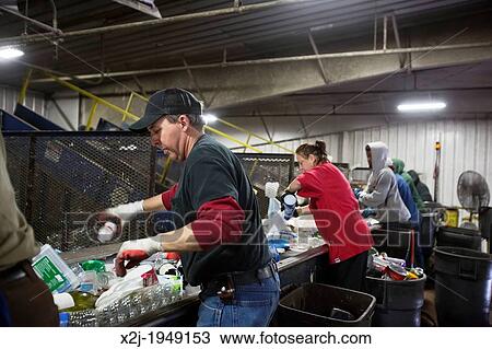 Troy, Michigan - Low-wage workers sort paper, glass, plastic, and metals for recycling at the Southeastern Oakland County Resource Recovery Authority. The materials are picked up in curbside recycling bins at homes in 12 suburban Detroit communities. View Large Photo Image Stock Image - Troy, Michigan - Low-wage workers sort paper, glass, plastic, and metals for recycling at the Southeastern Oakland County Resource Recovery Authority. The materials are picked up in curbside recycling bins at homes in 12 suburban Detroit communities.. Fotosearch