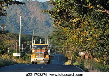 Stock Photograph - Truck along a road near Filadelfia, Guanacaste Costa Rica. Fotosearch