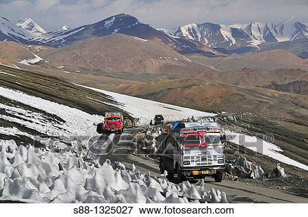 Stock Photo - Truck pass through by the Taglang La, 2nd high pass in the world. Jammu and Kashmir, India. Fotosearch