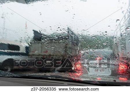 Stock Photography - Trucks and cars on a ferry in rain, New Brunswick, Canada. Fotosearch