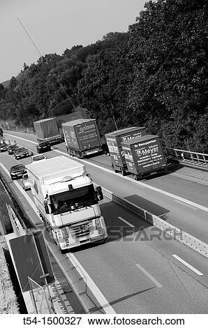 Trucks in Highway Construction View Large Photo Image Stock Photo - Trucks in Highway Construction. Fotosearch