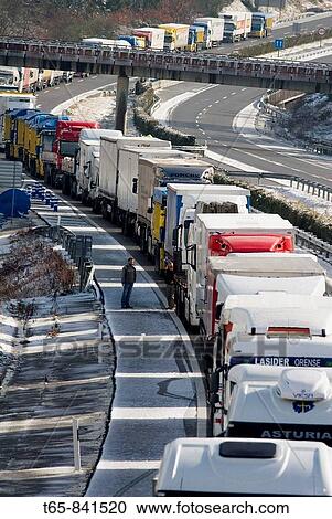 Trucks withheld because of the snow and ice on the highway A-6 in Galicia View Large Photo Image Stock Image - Trucks withheld because of the snow and ice on the highway A-6 in Galicia. Fotosearch