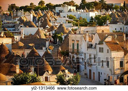 Trulli houses of the Rione Monti Area of Alberobello, Puglia, Italy View Large Photo Image Stock Photograph - Trulli houses of the Rione Monti Area of Alberobello, Puglia, Italy. Fotosearch