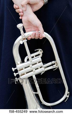 Stock Photo - Trumpet player taking spare time.. Fotosearch