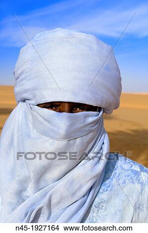 Tuareg; Close up; special Costume for Festival; Libyan Arab Jamahiriya; Libyan Desert. View Large Photo Image Picture - Tuareg; Close up; special Costume for Festival; Libyan Arab Jamahiriya; Libyan Desert.. Fotosearch