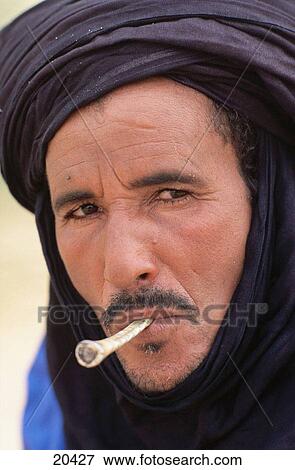 Tuareg man smoking. Timbuktu. Mali. West Africa View Large Photo Image Stock Photo - Tuareg man smoking. Timbuktu. Mali. West Africa. Fotosearch