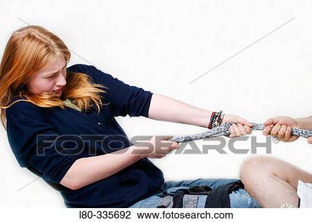 Tug-of-war with socks View Large Photo Image Stock Image - Tug-of-war with socks. Fotosearch