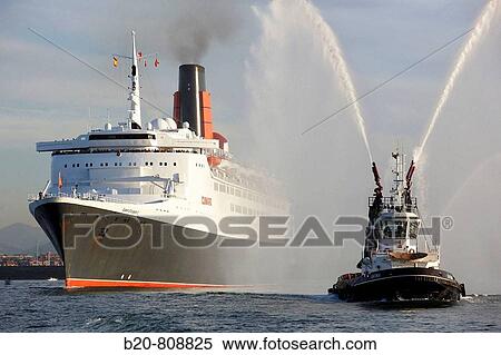 Tugboat and cruise liner Queen Elizabeth 2. Port of Bilbao, Biscay, Basque Country, Spain View Large Photo Image Stock Photography - Tugboat and cruise liner Queen Elizabeth 2. Port of Bilbao, Biscay, Basque Country, Spain. Fotosearch
