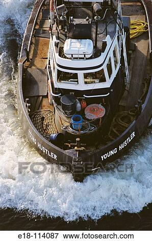Stock Photo - Tugboat on Fraser River, Vancouver. British Columbia, Canada. Fotosearch
