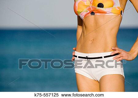 Stock Photography - Tummy, healthy, caucasian/hispanic, age 30 to 40.. Fotosearch