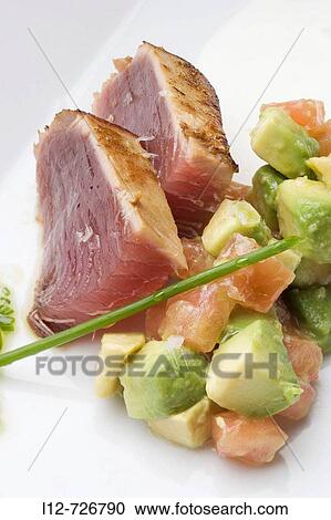 Tuna with avocado salad at restaurant A Estacion by chefs Xoan Crujeiras and Beatriz Sotelo, Cambre. La Corua province, Galicia, Spain View Large Photo Image Stock Image - Tuna with avocado salad at restaurant A Estacion by chefs Xoan Crujeiras and Beatriz Sotelo, Cambre. La Corua province, Galicia, Spain. Fotosearch