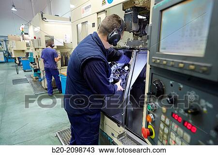 Tuning mooring. Checking with dial indicator. Area automated CNC lathes. Machined Indecober. Machining of precision parts in series. Automotive industry. Berriz. Bizkaia. Basque Country. Spain. View Large Photo Image Stock Image - Tuning mooring. Checking with dial indicator. Area automated CNC lathes. Machined Indecober. Machining of precision parts in series. Automotive industry. Berriz. Bizkaia. Basque Country. Spain.. Fotosearch