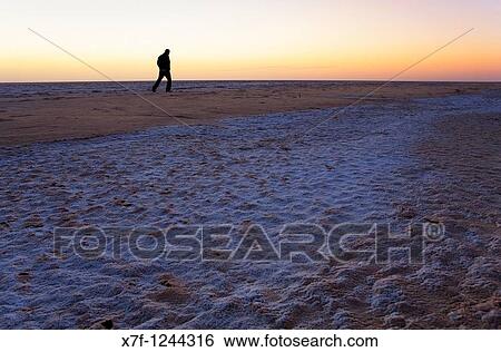Tunisia Chot el Jerid, the largest dry salt lake in Tunisia View Large Photo Image Stock Photograph - Tunisia Chot el Jerid, the largest dry salt lake in Tunisia. Fotosearch