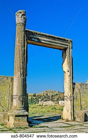 Tunisia, Dougga (also known as Thugga), impressive Roman ruins, tall doorway View Large Photo Image Stock Photo - Tunisia, Dougga (also known as Thugga), impressive Roman ruins, tall doorway. Fotosearch