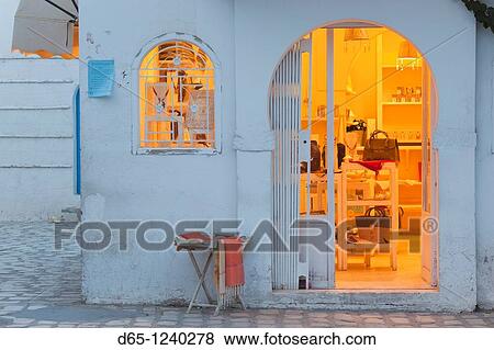 Tunisia, Jerba Island, Houmt Souq, shop in the evening View Large Photo Image Stock Photo - Tunisia, Jerba Island, Houmt Souq, shop in the evening. Fotosearch