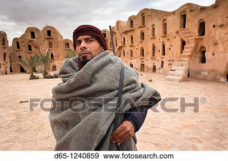 Tunisia, Ksour Area, Ksar Ouled Soltane, middle-aged Tunisian man, R, MR-TUN-10-004 View Large Photo Image Stock Photo - Tunisia, Ksour Area, Ksar Ouled Soltane, middle-aged Tunisian man, R, MR-TUN-10-004. Fotosearch