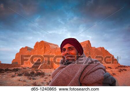 Stock Photography - Tunisia, Ksour Area, Ksar Ouled Soltane, middle-aged Tunisian man, R, MR-TUN-10-004. Fotosearch
