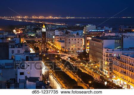 Stock Photography - Tunisia, Tunis, Avenue Habib Bourguiba, elevated view towards Place du 7 Novembre 1987, evening. Fotosearch