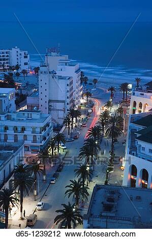 Tunisia, Tunisian Central Coast, Sousse, elevated view of Avenue Habib Bourguiba towards Boujaffar Beach, dusk View Large Photo Image Stock Image - Tunisia, Tunisian Central Coast, Sousse, elevated view of Avenue Habib Bourguiba towards Boujaffar Beach, dusk. Fotosearch