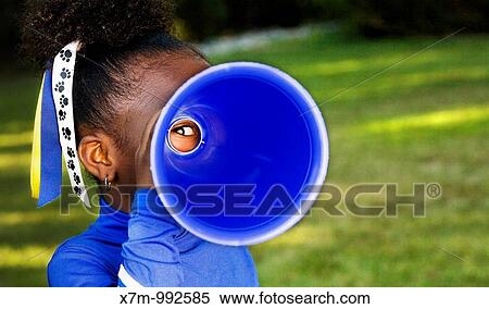 Tunnel vision A little girl playfully peers through a megaphone View Large Photo Image Stock Photography - Tunnel vision A little girl playfully peers through a megaphone. Fotosearch