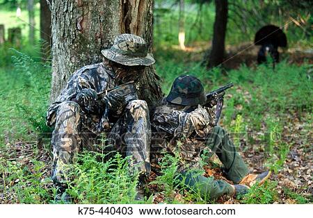 Stock Image - Turkey hunting, father and son. Pennsylvania, USA. Fotosearch