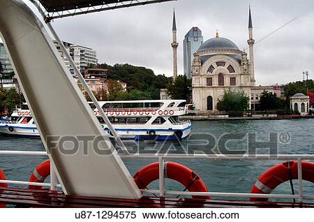 Stock Photography - Turkey, Istanbul, Bosphorus Strait, Ferry Boat, Dolmabahce Mosque. Fotosearch