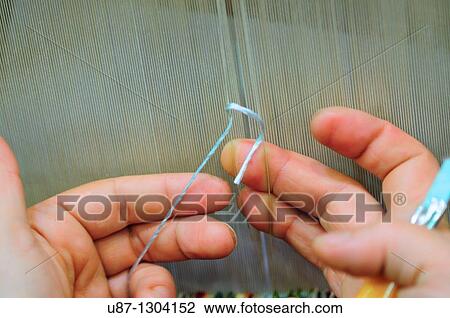 Stock Image - Turkey, Istanbul, Carpet Making, Woman Knotting a Carpet. Fotosearch