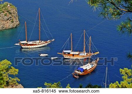 Stock Photography - Turkey, Oludeniz, near Fethiye, luxury yachts anchored in bay. Fotosearch