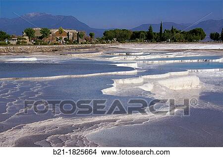 Turkey- PAMUKKALE, meaning? cotton castle? in Turkish, is a natural site in Denizli Province in southwestern Turkey View Large Photo Image Picture - Turkey- PAMUKKALE, meaning? cotton castle? in Turkish, is a natural site in Denizli Province in southwestern Turkey . Fotosearch